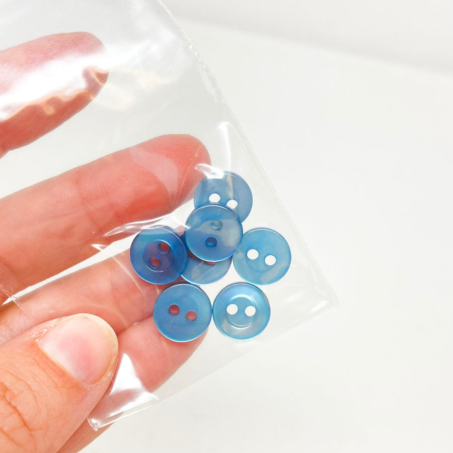 7 Small Blue Buttons