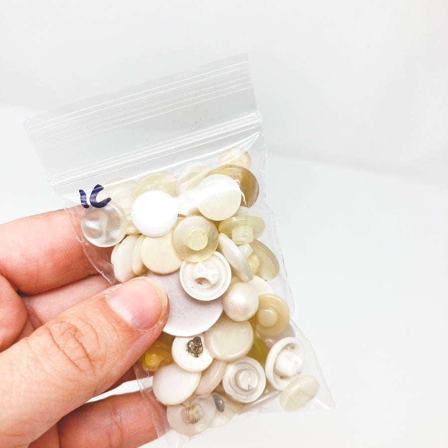 Small Bag of Clear & White Shank Buttons