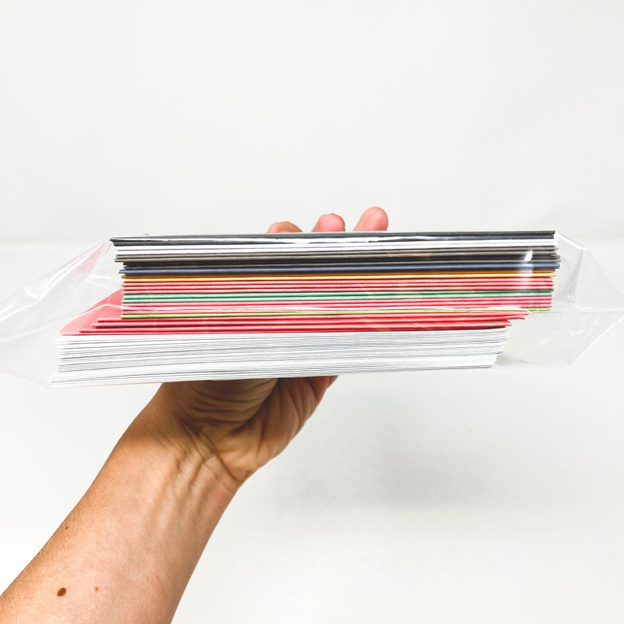 Bundle of Multicolored Cards with White Envelopes