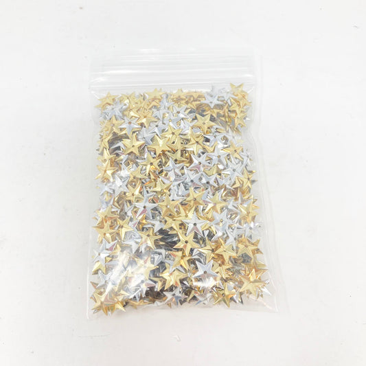 Bundle of silver and gold star sequins