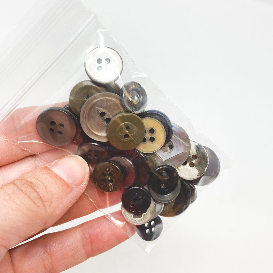 Small Bag of Mixed Size/Color Brown Buttons