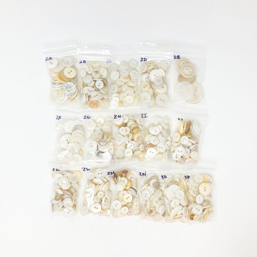 2 Series: Small Bag of Mixed Clear & White Buttons