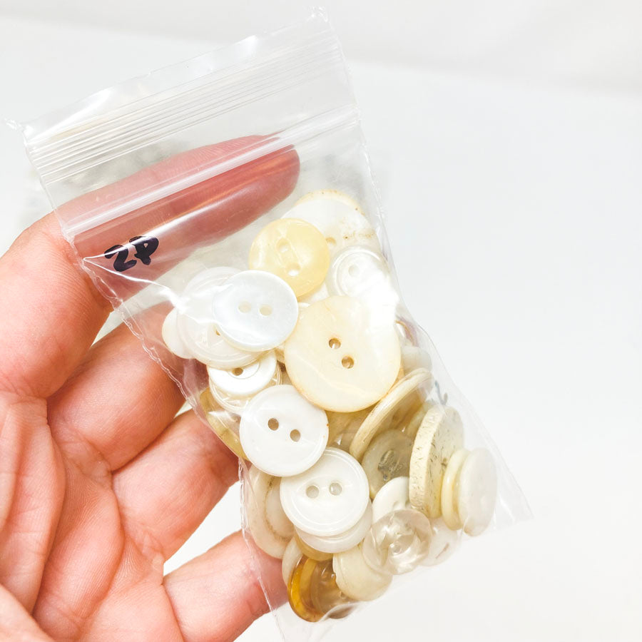 2 Series: Small Bag of Mixed Clear & White Buttons