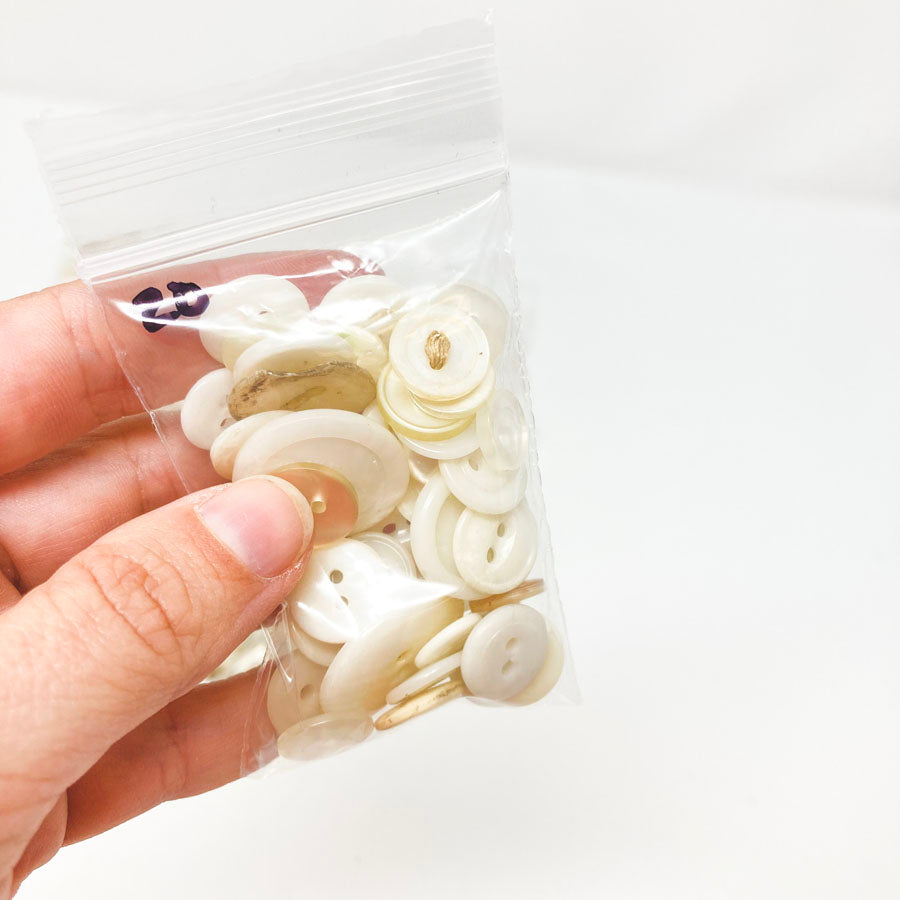 2 Series: Small Bag of Mixed Clear & White Buttons