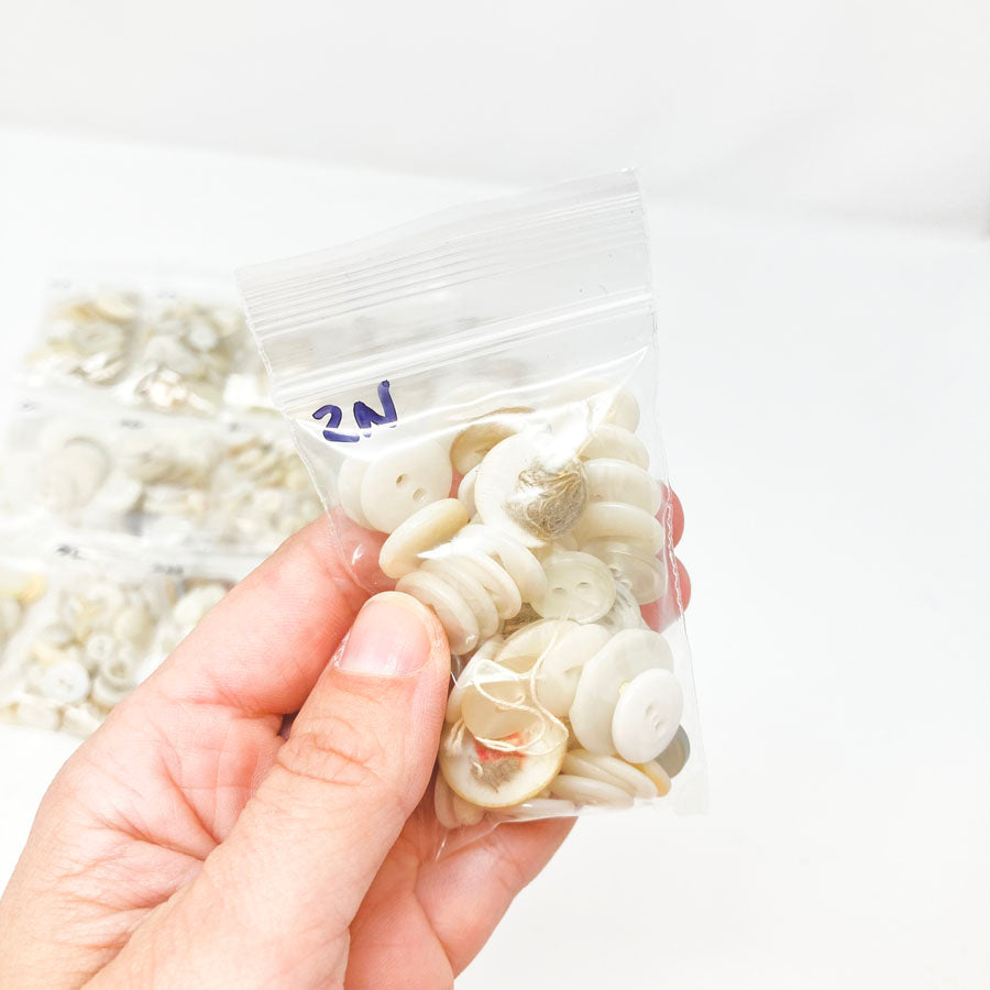 2 Series: Small Bag of Mixed Clear & White Buttons