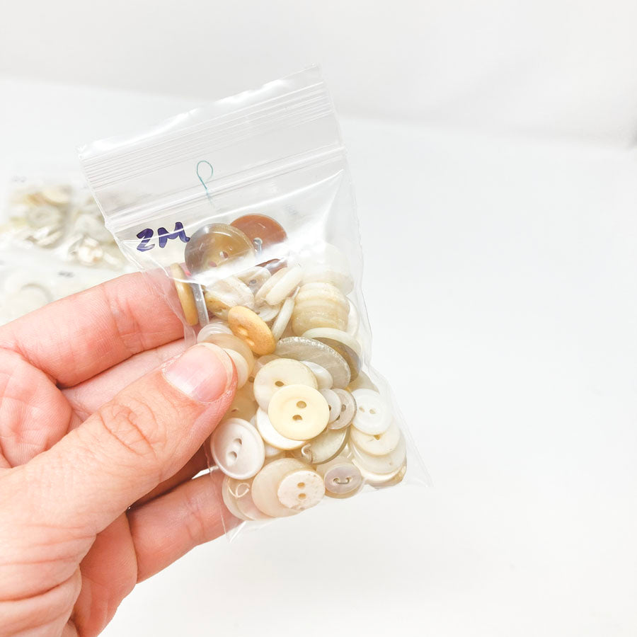 2 Series: Small Bag of Mixed Clear & White Buttons
