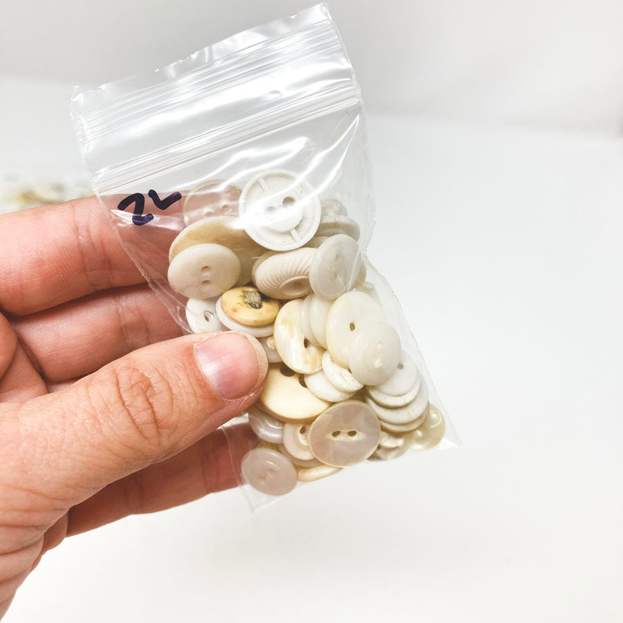 2 Series: Small Bag of Mixed Clear & White Buttons