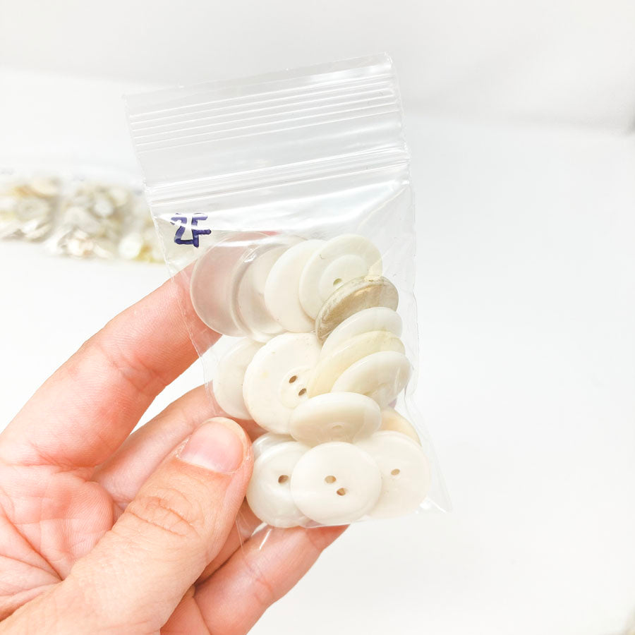 2 Series: Small Bag of Mixed Clear & White Buttons