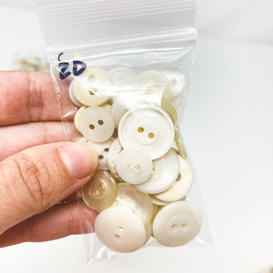 2 Series: Small Bag of Mixed Clear & White Buttons