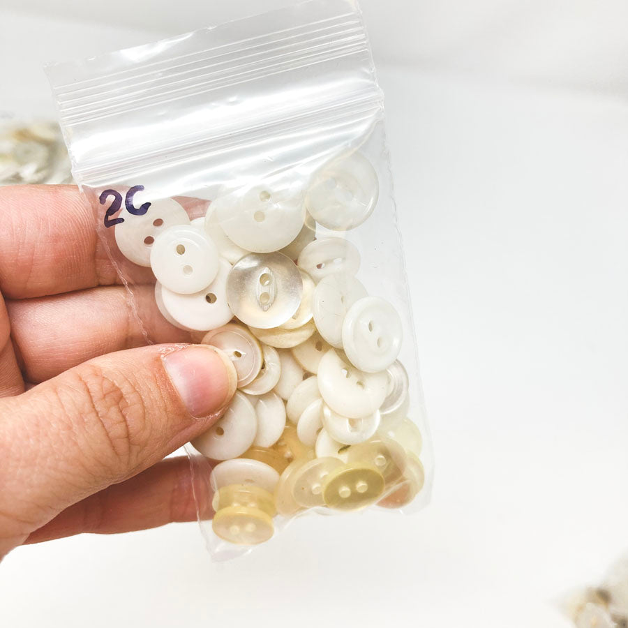 2 Series: Small Bag of Mixed Clear & White Buttons