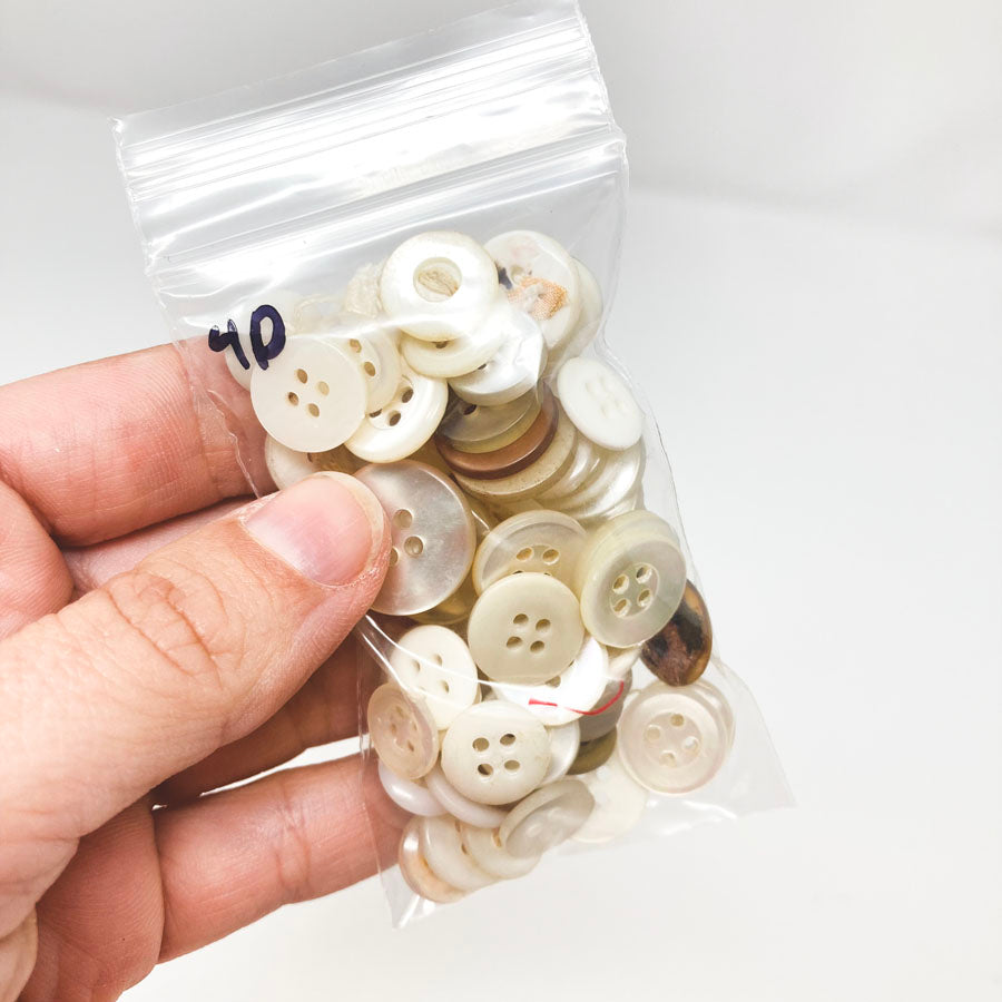4 Series: Small Bag of Mixed Clear & White Buttons