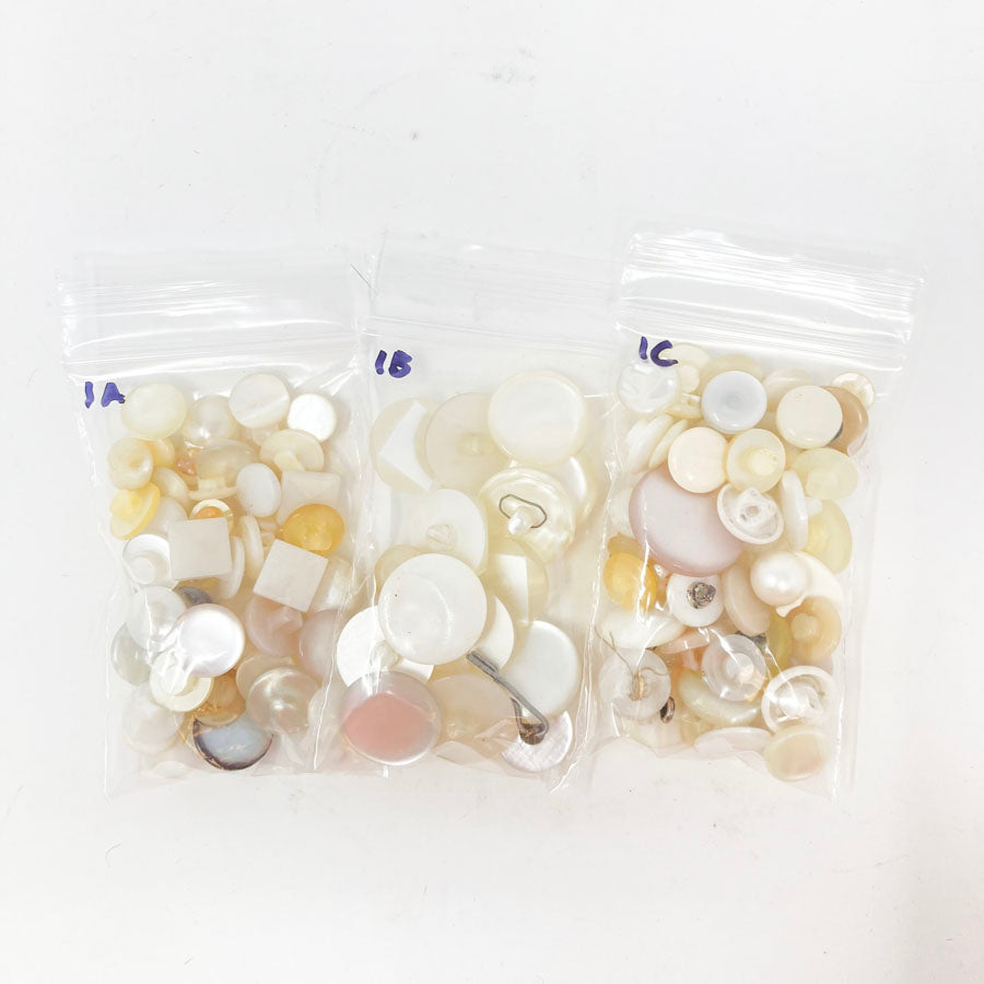 Small Bag of Clear & White Shank Buttons