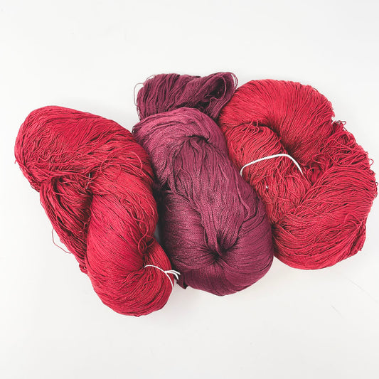 Flanked Burgundy Rayon Yarn Bundle