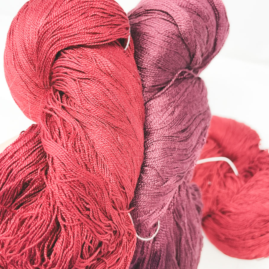 Flanked Burgundy Rayon Yarn Bundle