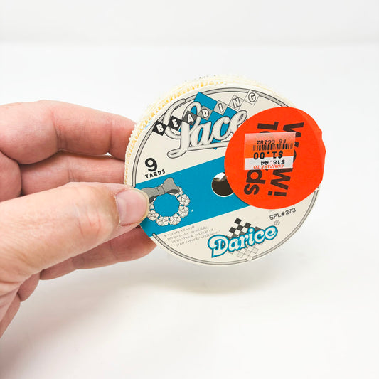 Spool of Darice Cream Lace Trim #273