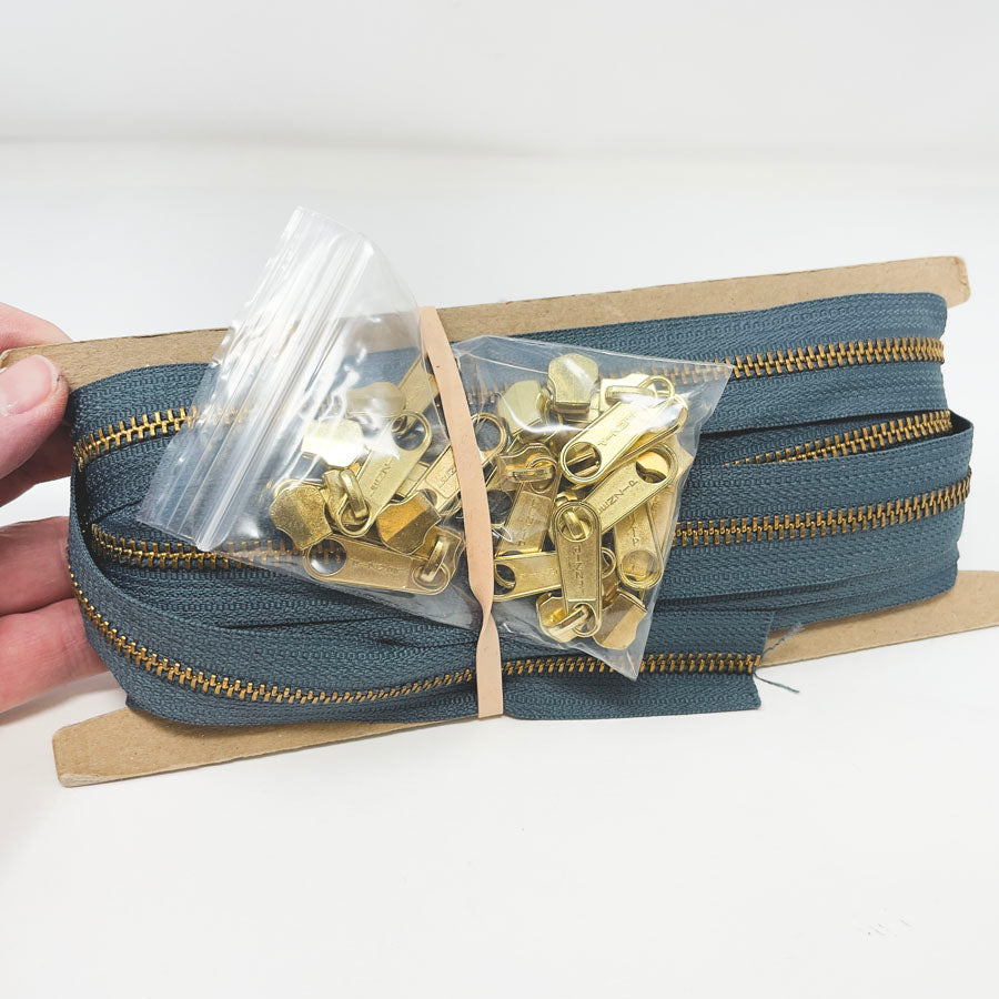 Metal Continuous Zipper Lengths with Gold Pulls