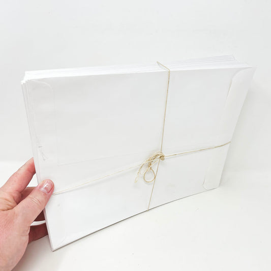Stack of White Catalog Envelopes