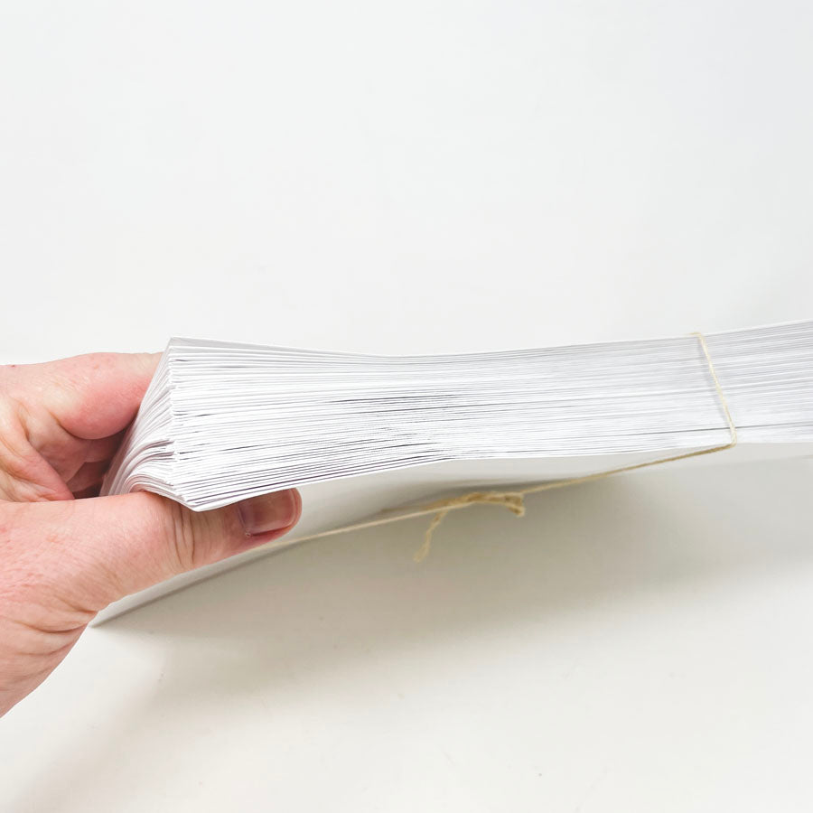 Stack of White Catalog Envelopes