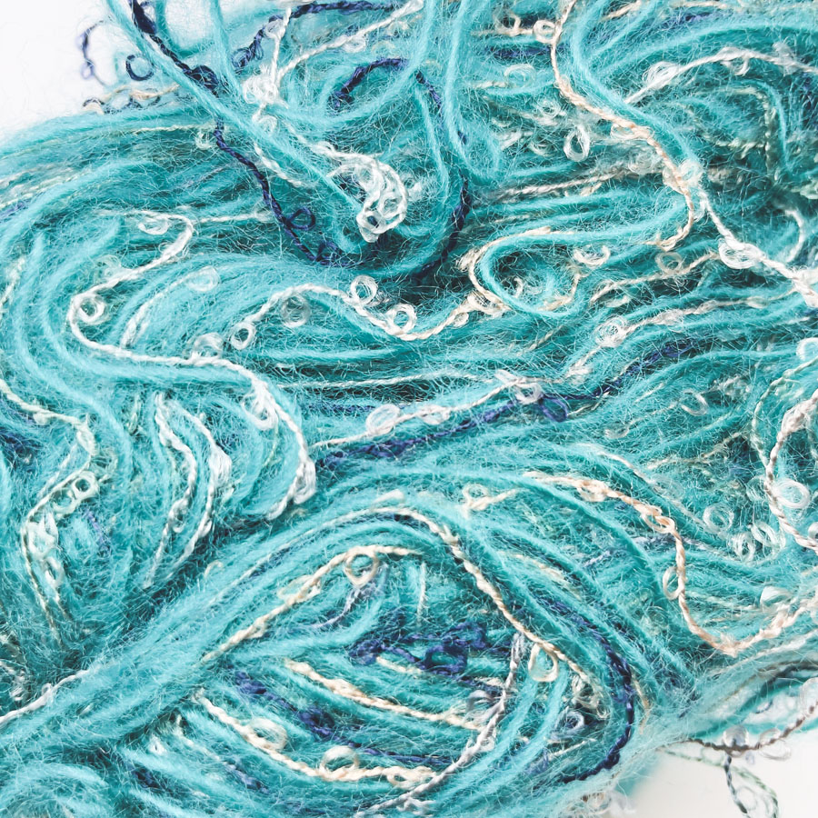 Bundle of Turquoise and Gold Yarn